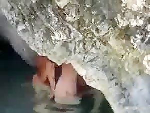 Couple underwater fuck under the rock