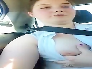 Horny chubby teen masturbates inside her car