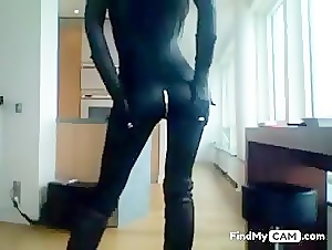 Sexy Milf In Catsuit & Boots Smoking