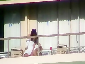 Amateur Voyeur Couple fucking in public on the Balcony