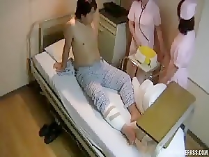 Dirty Japanese nurse gives blowjob and enjoys having a 69 in bed