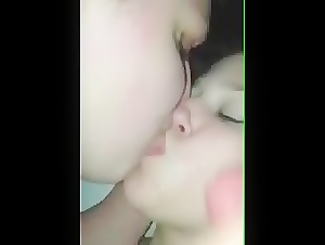 Bisexual girls kiss with cum