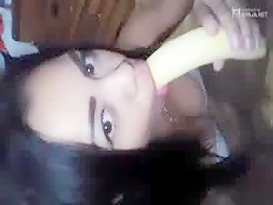 Girl plays with a Banana in her pretty pussy